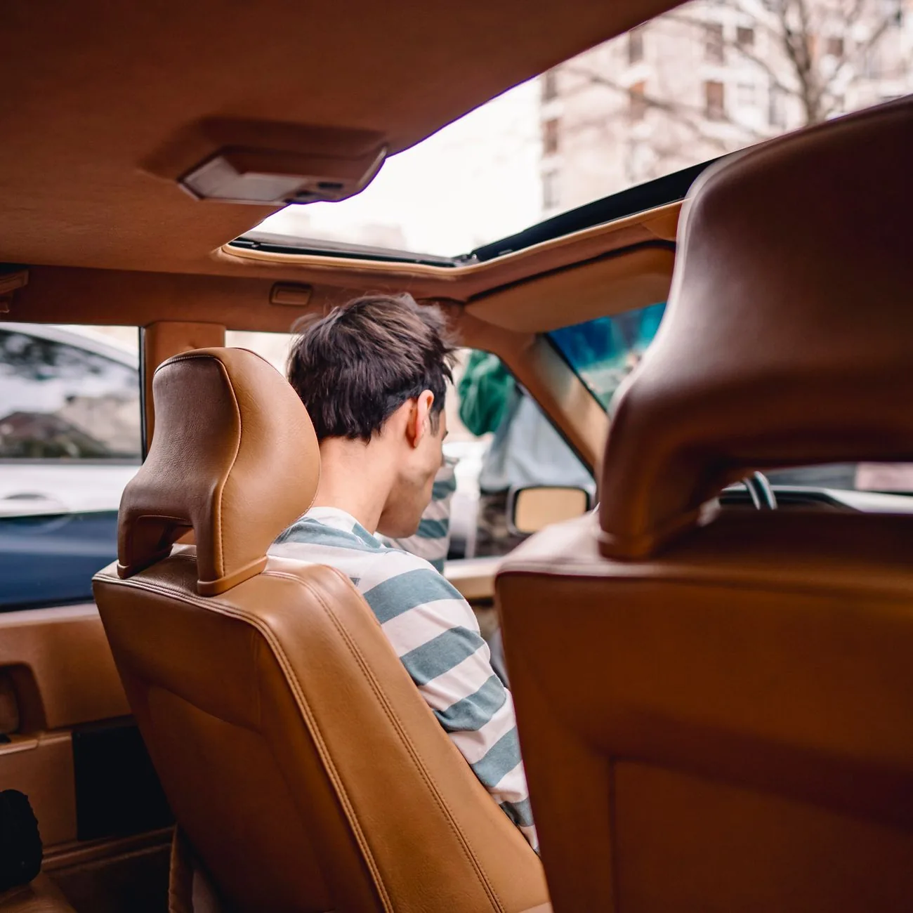 Careful interior detailing work inside a car cabin